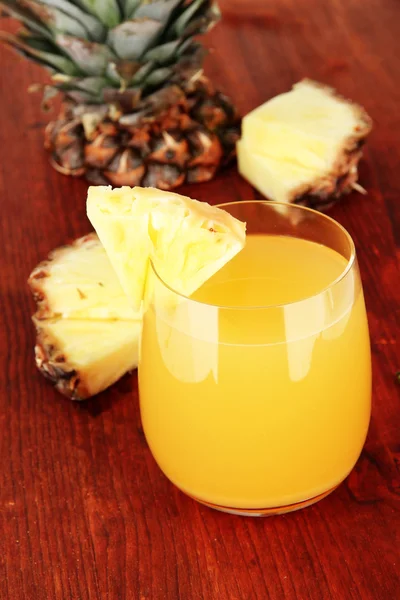 Delicious pineapple juice on table close-up — Stock Photo, Image