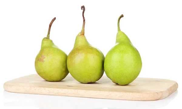 Pears on wooden cutting board, isolated on white — Stock Photo, Image