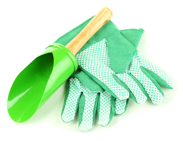 Small gardening shovel and gloves isolated on white — Stock Photo, Image