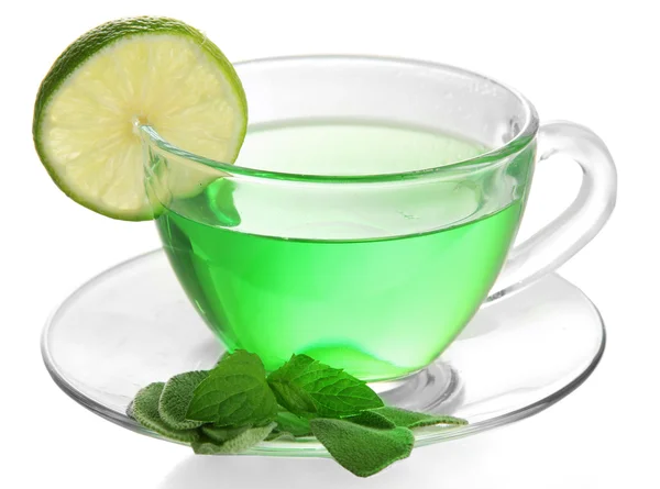 Transparent cup of green tea with sage and lime isolated on white — Stock Photo, Image