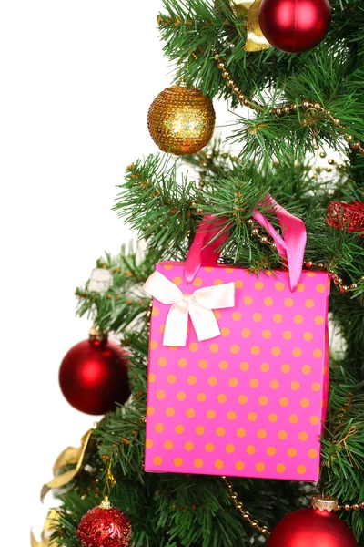 Gift on Christmas tree isolated on white — Stock Photo, Image