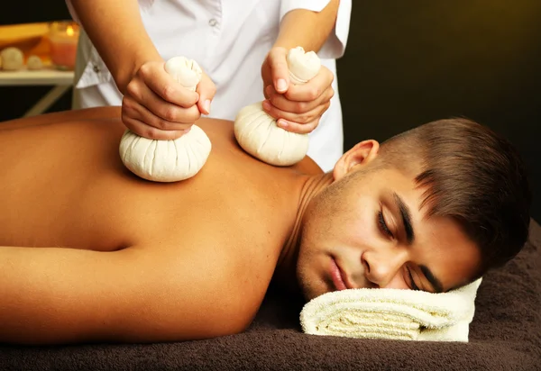 Young man having back massage close up — Stock Photo, Image