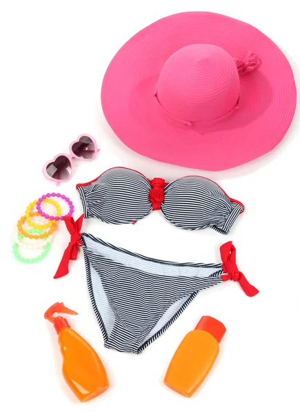 Swimsuit and beach items isolated on white — Stock Photo, Image