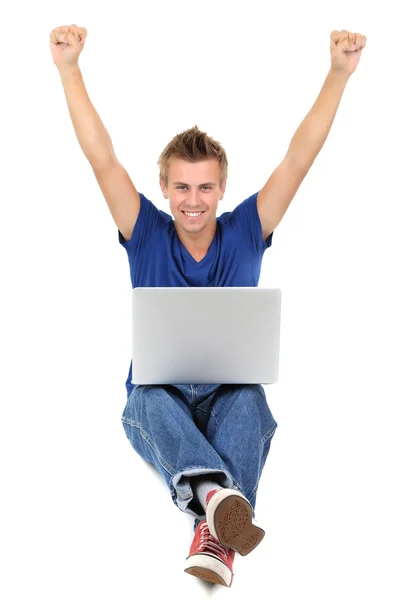 A handsome young man with laptop isolated on white — Stock Photo, Image