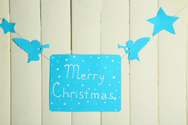 Signboard with words Merry Christmas on wooden table background close-up — Stock Photo, Image