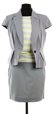 manken üzerinde beyaz izole üzerinde sarı bluz, gri ceket ve gri etek