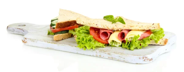 Sabrosos sándwiches con salchichas de salami y verduras en la tabla de cortar, aislados en blanco —  Fotos de Stock