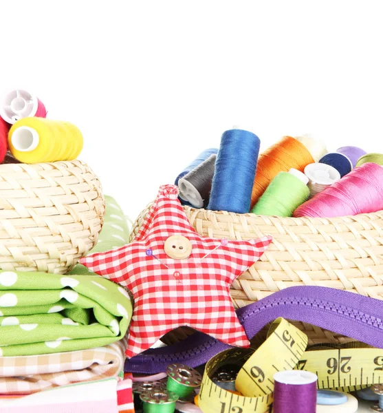 Wicker baskets with accessories for needlework isolated on white — Stock Photo, Image