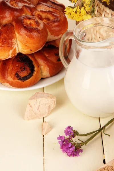 Dry yeast with pastry on wooden table close-up — Stock Photo, Image