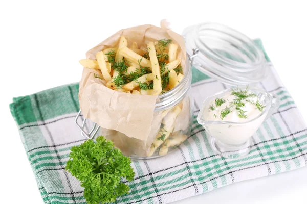 Pommes frites i bank på servett isolerad på vit — Stockfoto