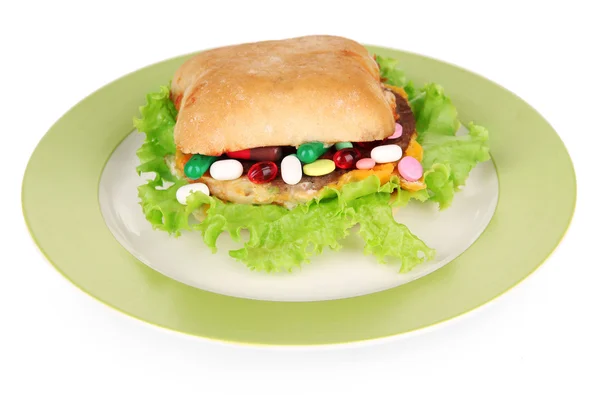 Концептуальный образ для ухода за питанием: разнообразные витамины и пищевые добавки в bun.Isolated на белом — стоковое фото