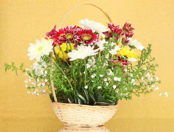 Beautiful flowers on yellow background — Stock Photo, Image