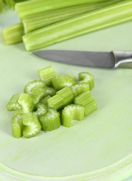 Fresh green celery on cutting board close-up — Stock Photo, Image