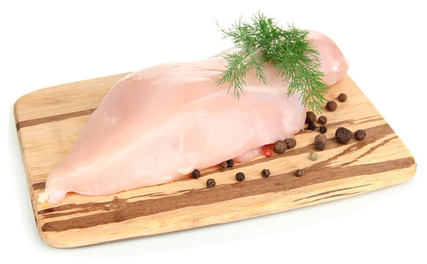 Rå kycklingfiléer på träplatta, isolerad på vit — Stockfoto