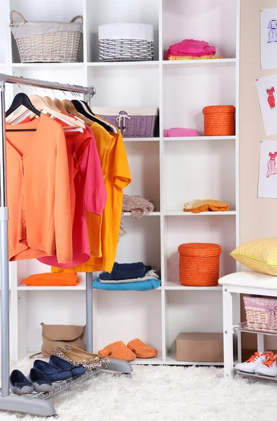 Women wardrobe in sunny colors — Stock Photo, Image