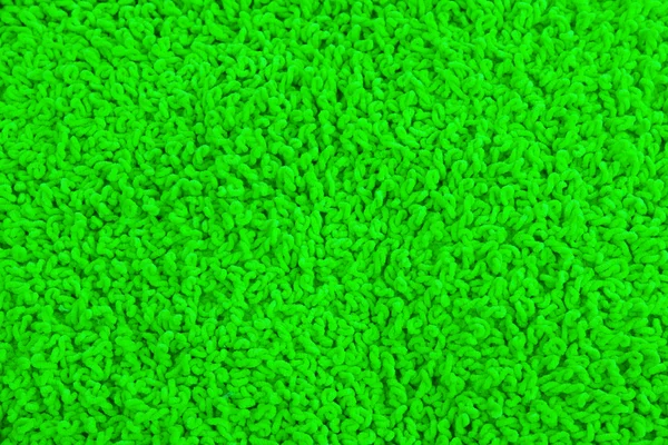 Fleecy green pillow close-up background — Stock Photo, Image