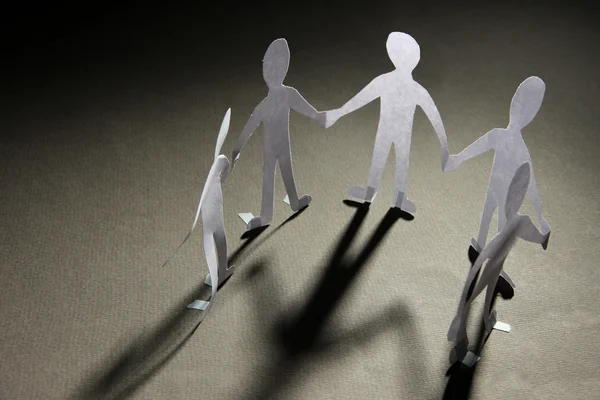 Paper people in social network concept on dark background — Stock Photo, Image