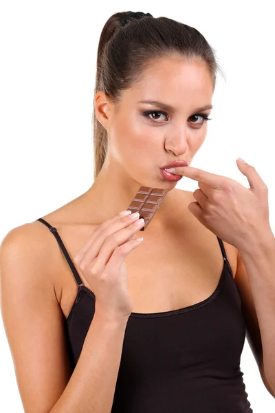 Portrait of beautiful young girl with chocolate isolated on white — Stock Photo, Image