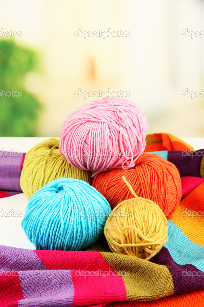 Multicolored clews with bright scarf closeup