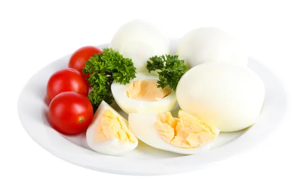 Huevos cocidos en plato aislados en blanco — Foto de Stock