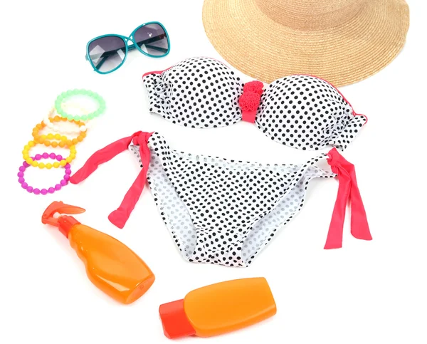 Swimsuit and beach items isolated on white — Stock Photo, Image