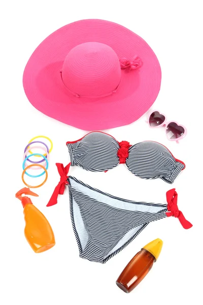 Swimsuit and beach items isolated on white — Stock Photo, Image