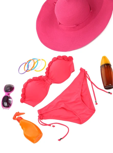 Swimsuit and beach items isolated on white — Stock Photo, Image