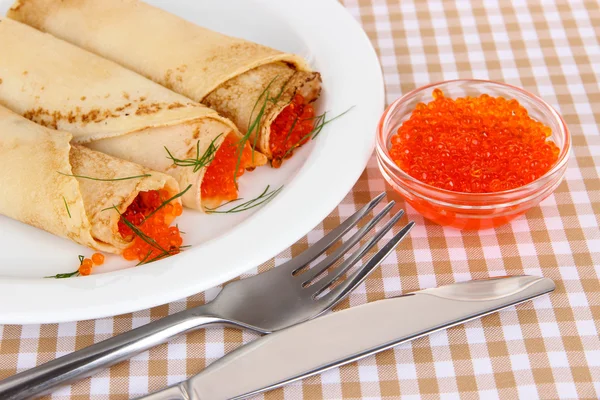 Delicious pancakes with red caviar on table close-up — Stock Photo, Image