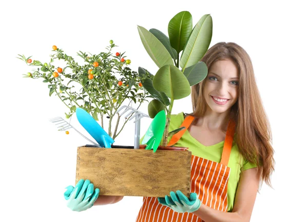 Vacker flicka trädgårdsmästare med blommor isolerad på vit — Stockfoto