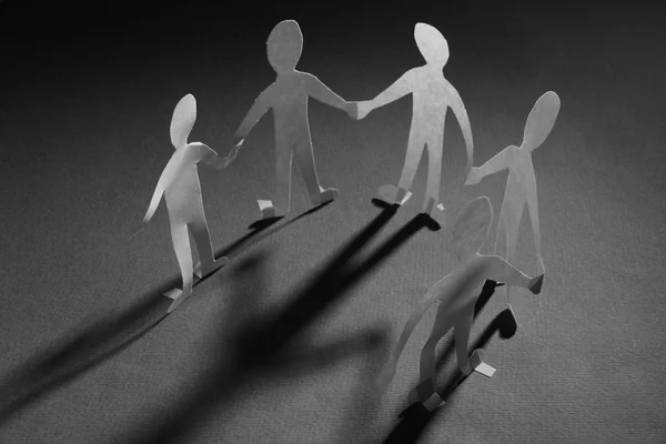Paper people in social network concept on dark background — Stock Photo, Image