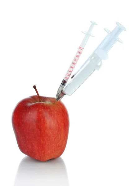 Injection into fresh red apple isolated on white — Stock Photo, Image