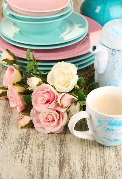 Lots beautiful dishes on wooden table close-up — Stock Photo, Image