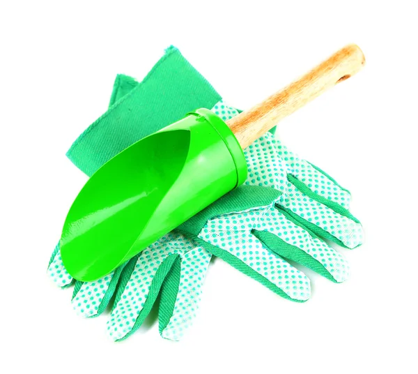 Small gardening shovel and gloves isolated on white — Stock Photo, Image