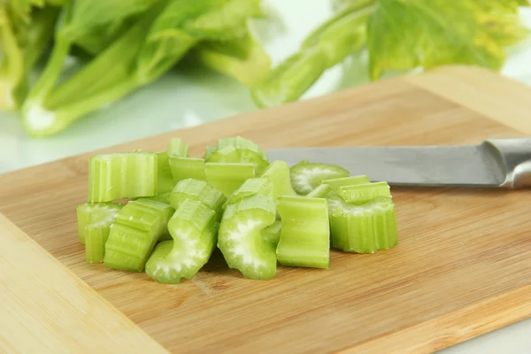 Fresh green celery on cutting board close-up — Stock Photo, Image