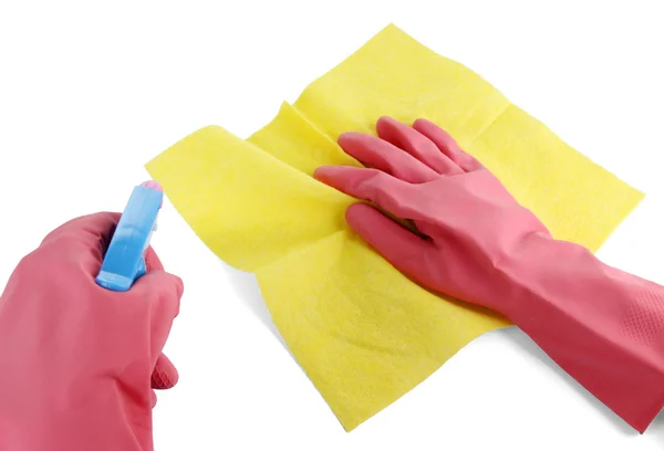 Hands in gloves wiping surface with yellow rag and spray isolated on white — Stock Photo, Image