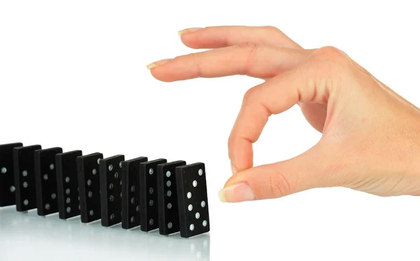 Mano spingendo domino isolato su bianco — Foto Stock