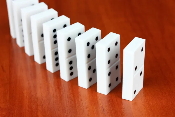 Dominoes on wooden background — Stock Photo, Image