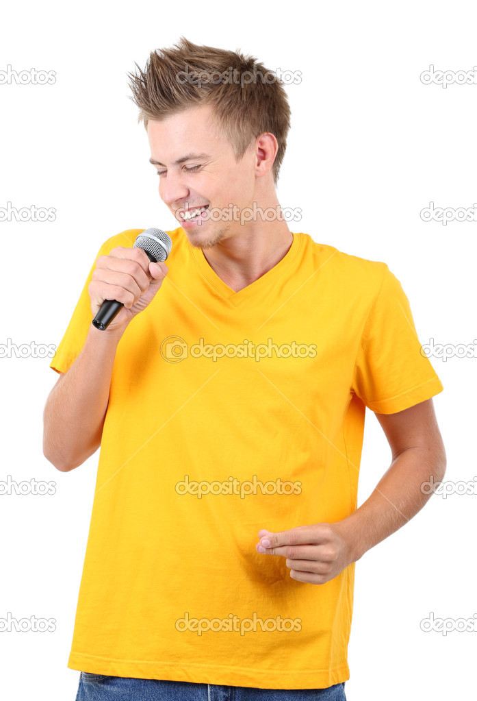 Handsome young man sings isolated on white