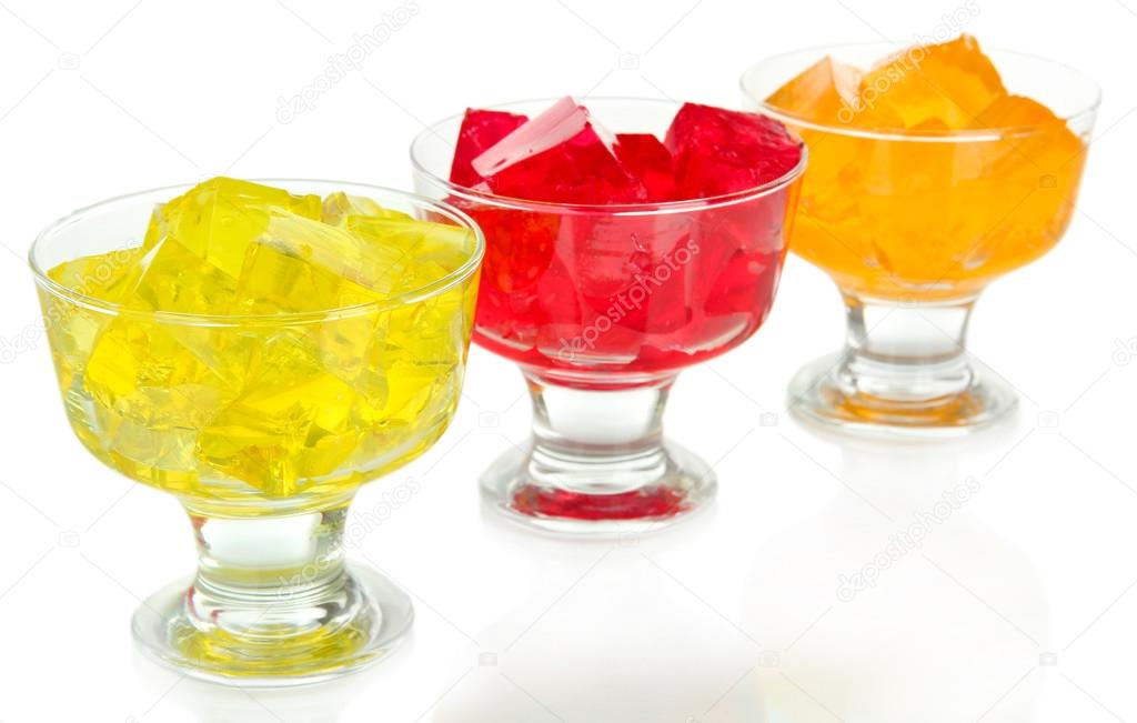Tasty jelly cubes in bowls isolated on white Stock Photo by ©belchonock