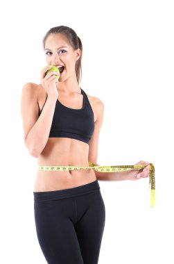 ölçme üzerinde beyaz izole bant ile genç bir kadın