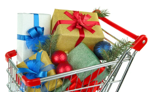 Christmas gifts in shopping trolley, isolated on white — Stock Photo, Image