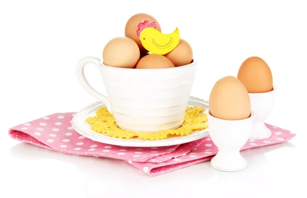 Яйца в различных посуда изолированы на белом — стоковое фото