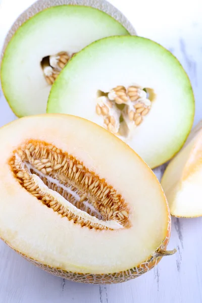 Ripe melons on wooden table close-up — Stock Photo, Image