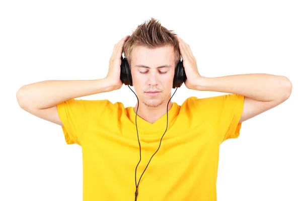 Przystojny młodzieniec, słuchając wobec muzyka na białym tle — Zdjęcie stockowe