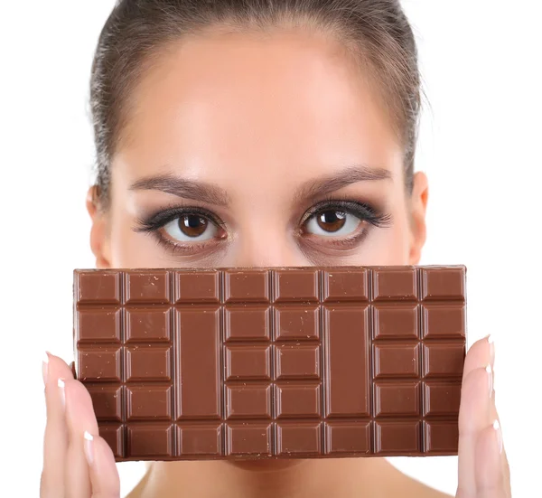 Porträt der schönen jungen Mädchen mit Schokolade isoliert auf weiß — Stockfoto