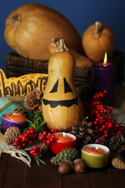 Composition for Halloween with pumpkins and candles close-up — Stock Photo, Image