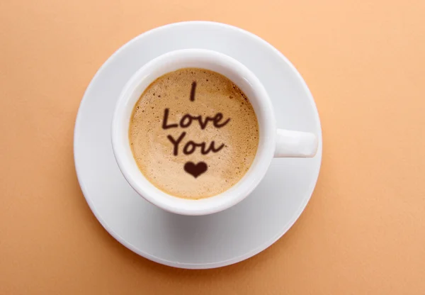 Cup of fresh coffee with words "I love you" — Stock Photo, Image