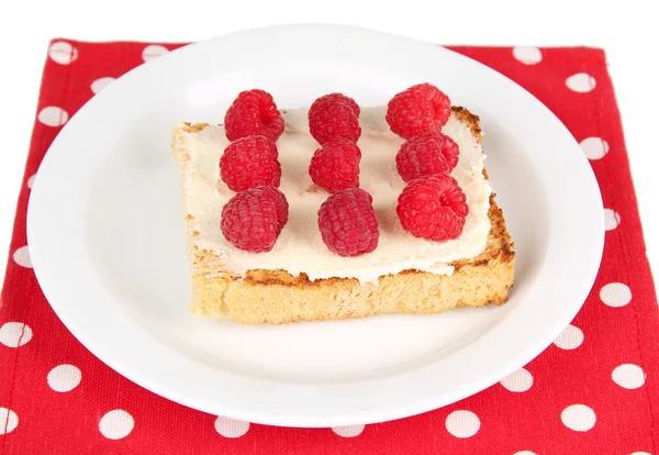 Delicious toast with raspberries on plate close-up — Stock Photo, Image