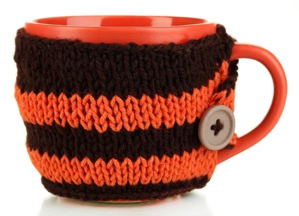 Cup with knitted thing on it isolated on white — Stock Photo, Image