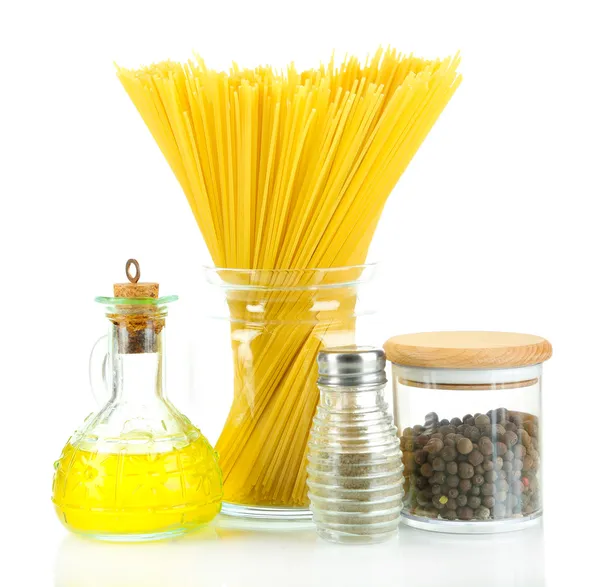 Pasta spaghetti with spices and oil isolated on white — Stock Photo, Image